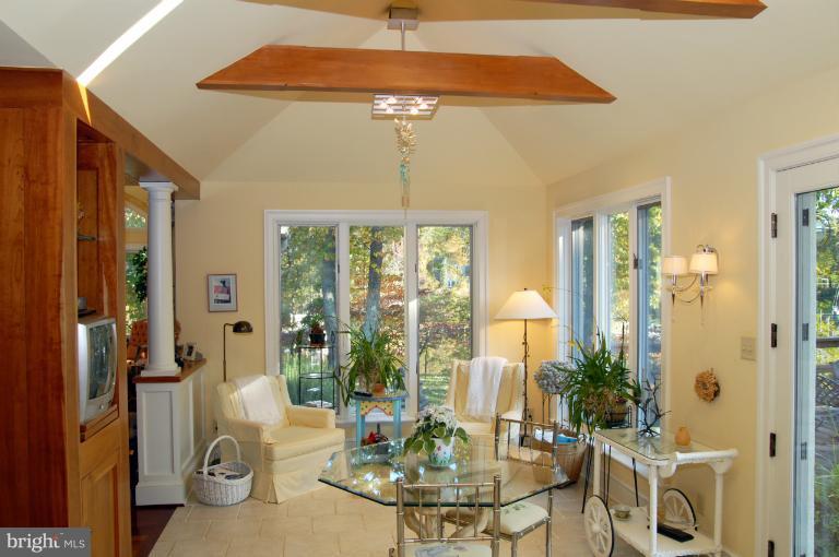 1821 Hidden Point Road Annapolis, MD 21409 - Photo 21 of 30 a view of a dining room with furniture window and outside view