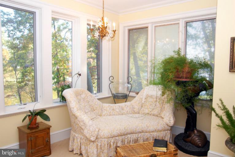 1821 Hidden Point Road Annapolis, MD 21409 - Photo 25 of 30 a living room with furniture and a large window