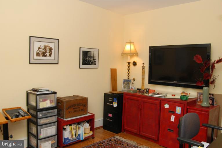 1821 Hidden Point Road Annapolis, MD 21409 - Photo 26 of 30 a living room with furniture and a flat screen tv