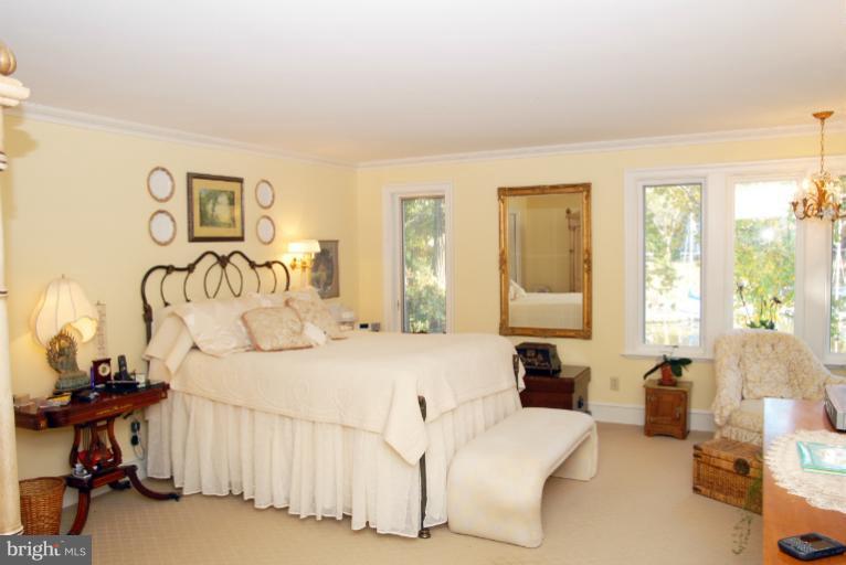 1821 Hidden Point Road Annapolis, MD 21409 - Photo 27 of 30 a bedroom with furniture and a window