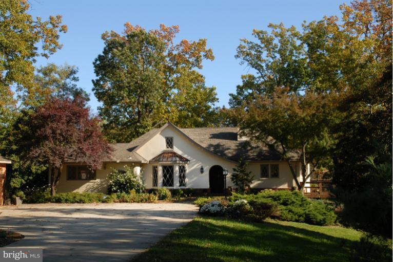 1821 Hidden Point Road Annapolis, MD 21409 - Photo 29 of 30 a front view of a house with a garden