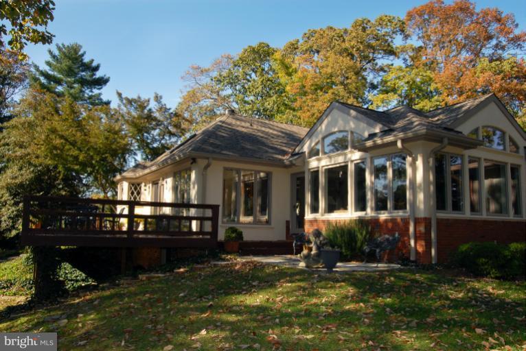 1821 Hidden Point Road Annapolis, MD 21409 - Photo 9 of 30 a front view of a house with a yard