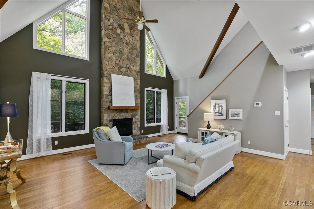 12293 Stancroft Road Rockville, VA 23146 - Photo 16 of 49 Living room featuring a fireplace, light hardwood