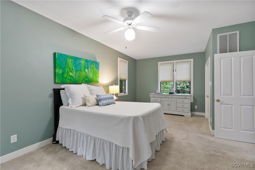 12293 Stancroft Road Rockville, VA 23146 - Photo 21 of 49 Bedroom featuring ceiling fan and light colored ca