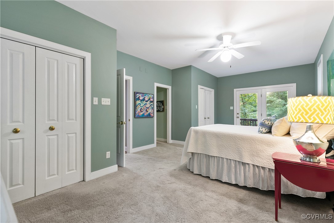 12293 Stancroft Road Rockville, VA 23146 - Photo 22 of 49 Bedroom with ceiling fan and light carpet
