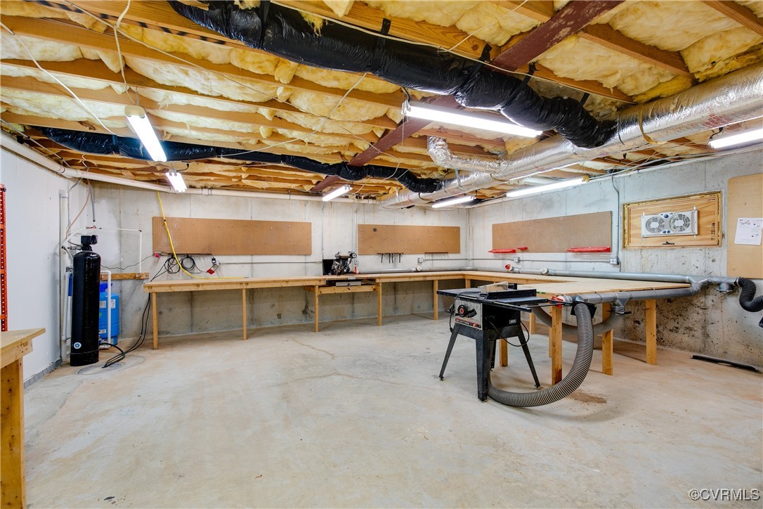 12293 Stancroft Road Rockville, VA 23146 - Photo 38 of 49 Basement workshop with exhaust vacuum