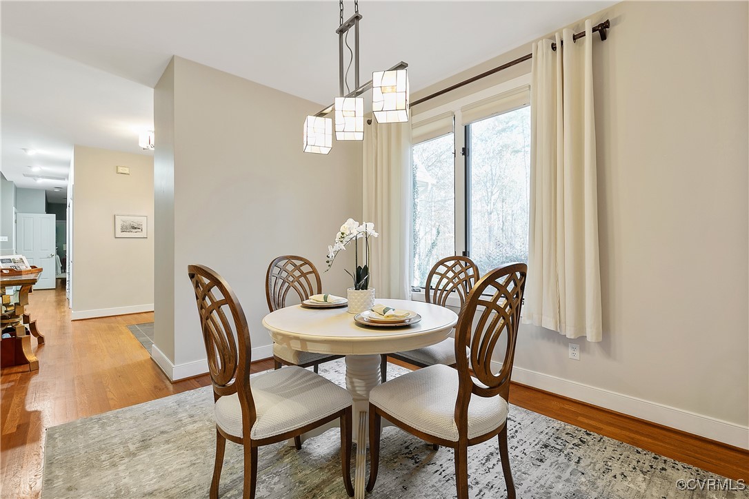 12293 Stancroft Road Rockville, VA 23146 - Photo 4 of 49 Dining room with chandelier and hardwood floors