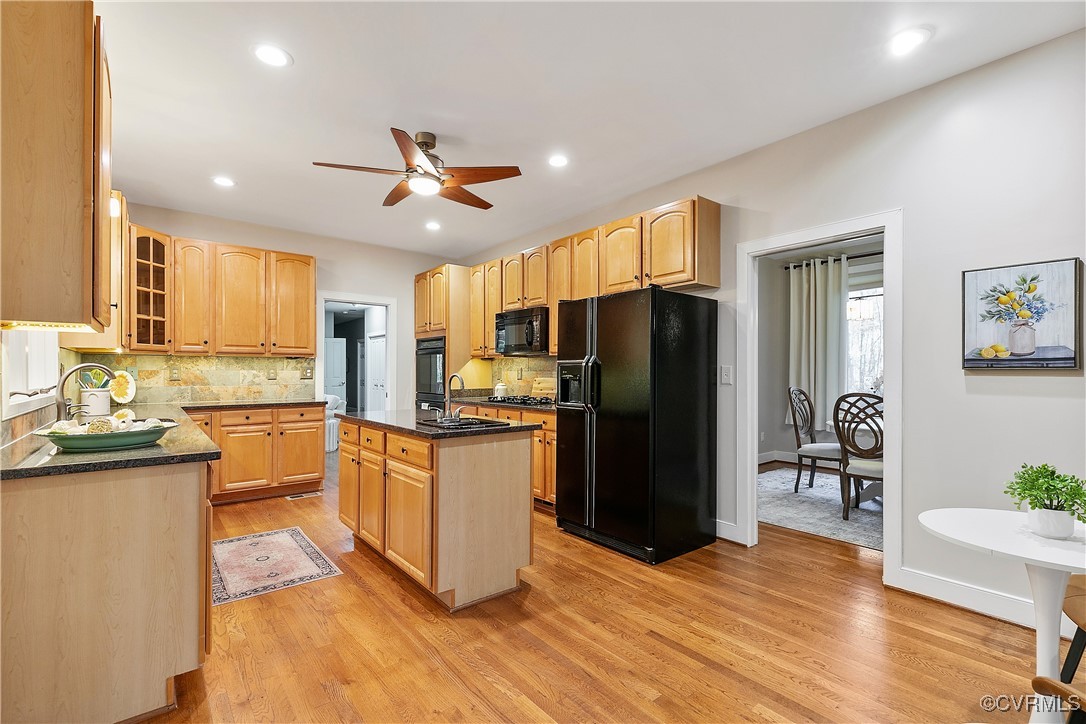 12293 Stancroft Road Rockville, VA 23146 - Photo 8 of 49 Kitchen with light hardwood flooring, tasteful bac