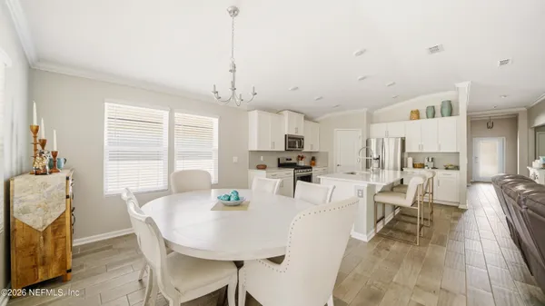 a view of a dining room with furniture