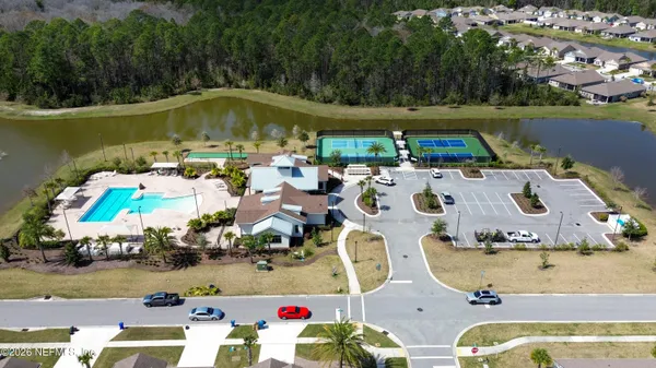a picture of a table and chairs in the balcony