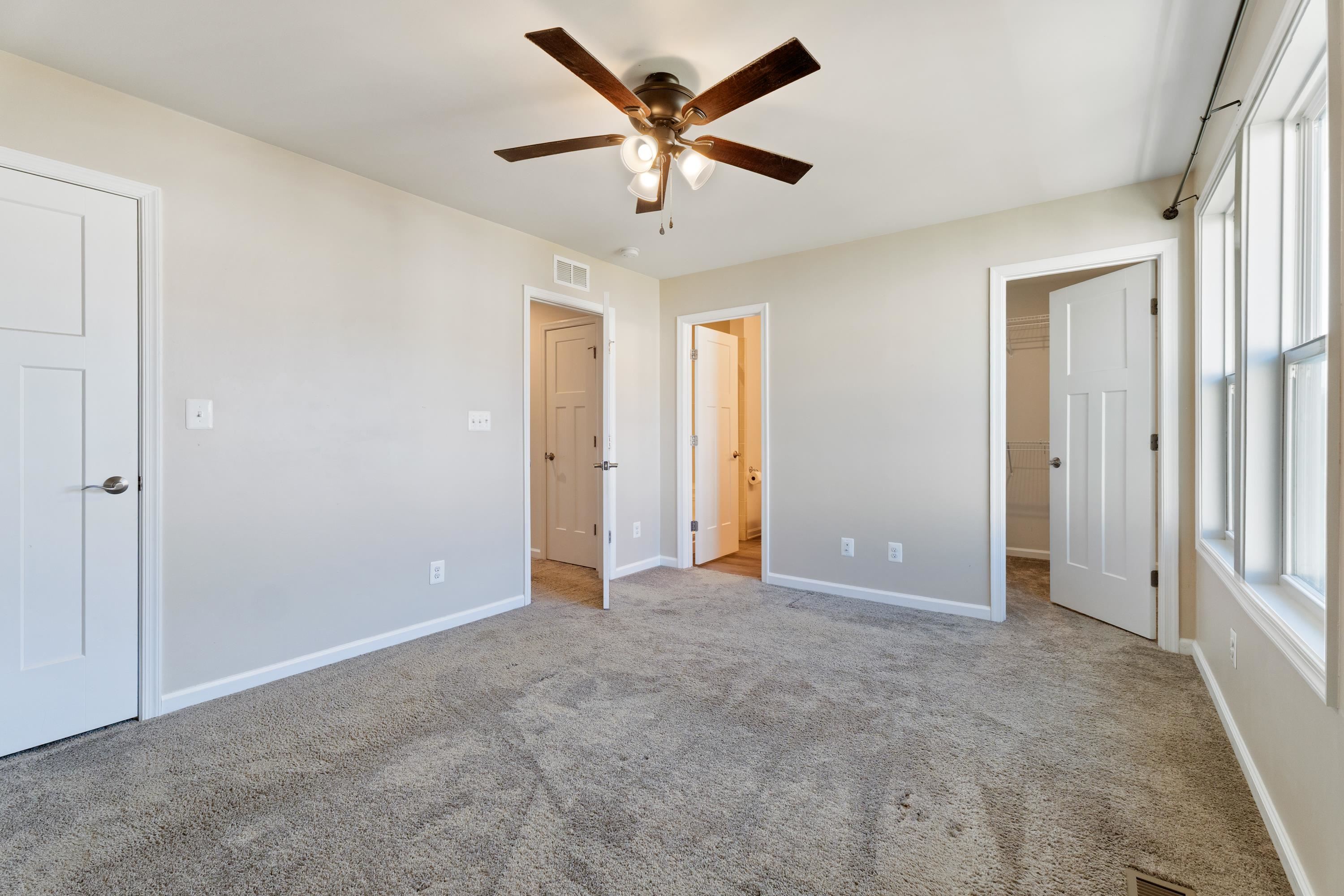 4416 Alston Street Crozet, VA 22932 - Photo 19 of 36 an empty room with closet and a ceiling fan