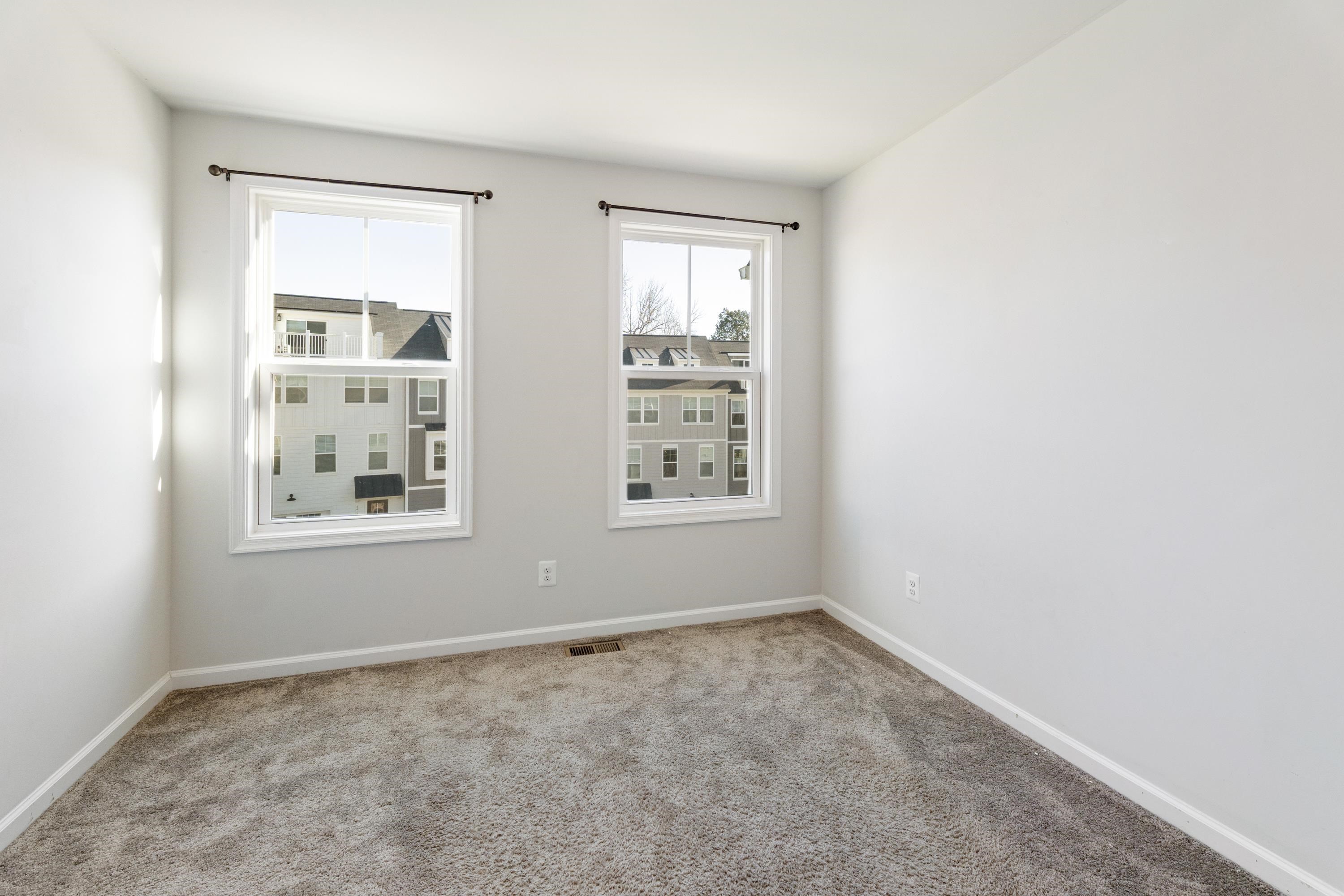 4416 Alston Street Crozet, VA 22932 - Photo 26 of 36 an empty room with windows