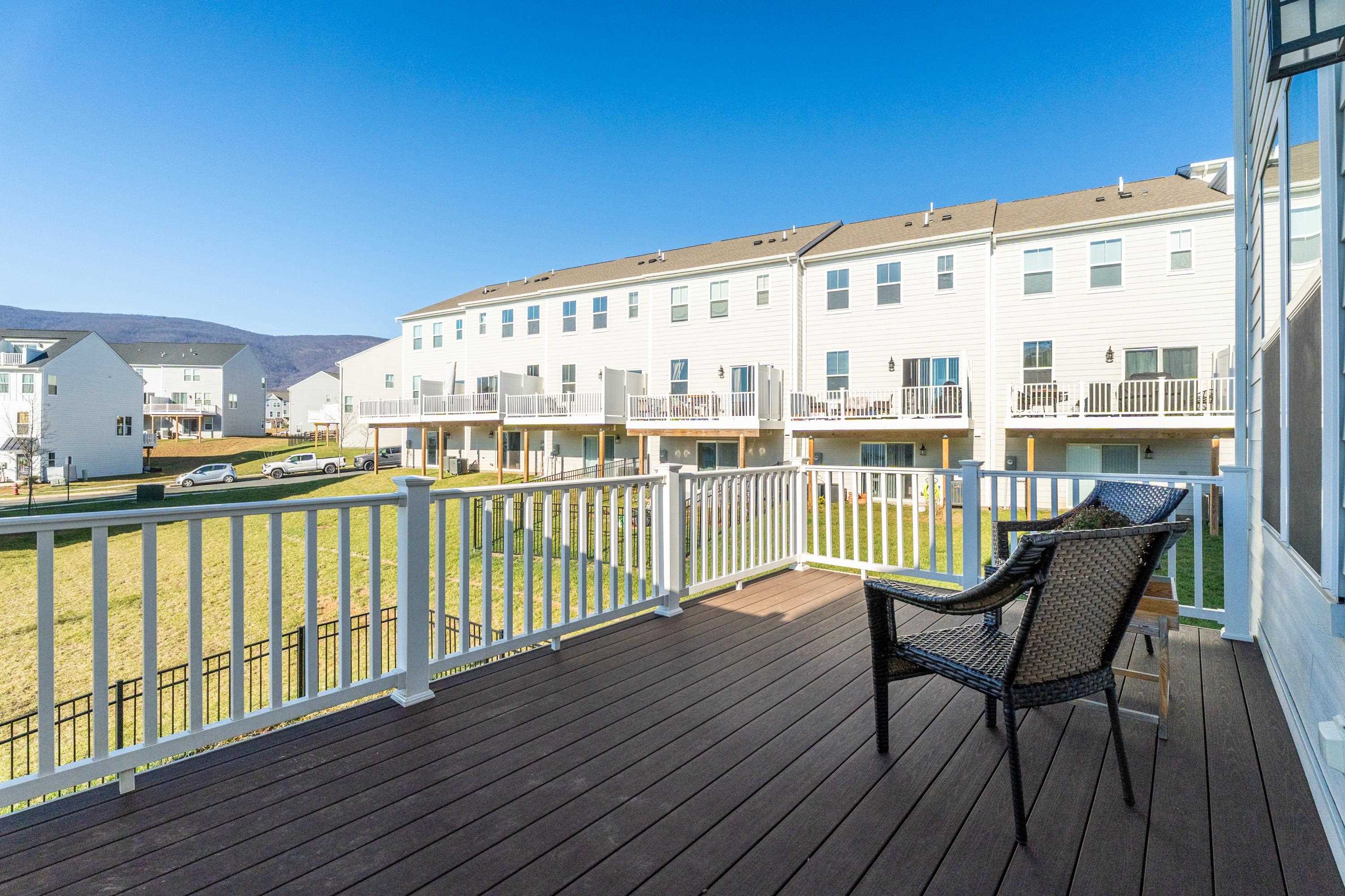 4416 Alston Street Crozet, VA 22932 - Photo 30 of 36 a view of a balcony with wooden floor