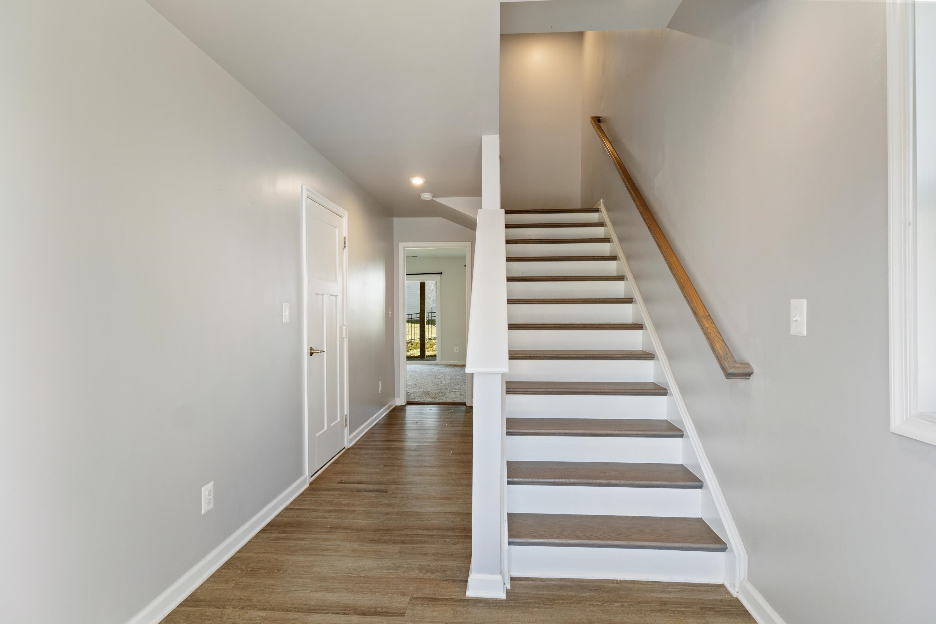 4416 Alston Street Crozet, VA 22932 - Photo 4 of 36 a view of a hallway with wooden floor and entryway