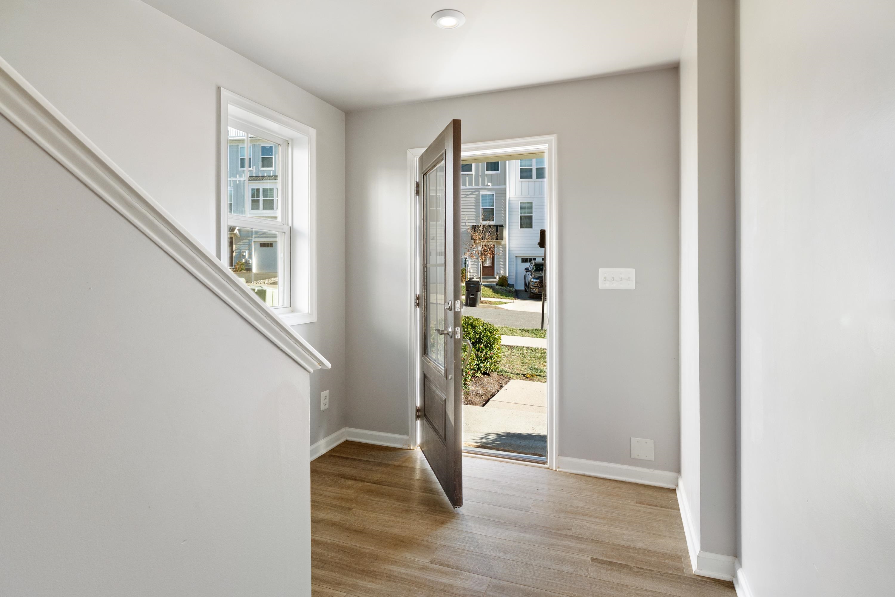 4416 Alston Street Crozet, VA 22932 - Photo 5 of 36 a view of entryway with wooden floor and stairs