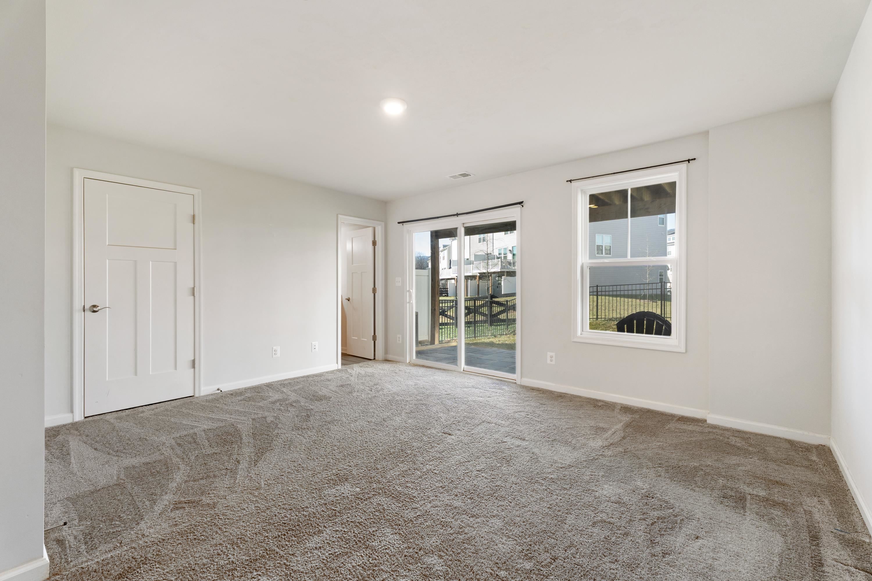 4416 Alston Street Crozet, VA 22932 - Photo 6 of 36 a view of an empty room with a window