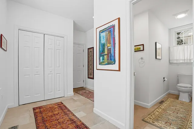 a view of a bathroom with sink and mirror