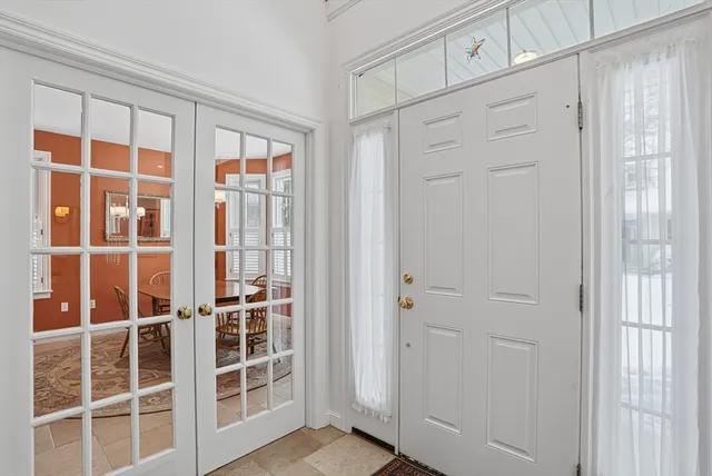 a view of empty room with windows