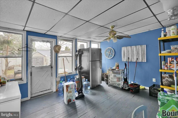 a bedroom with a bed and cabinets