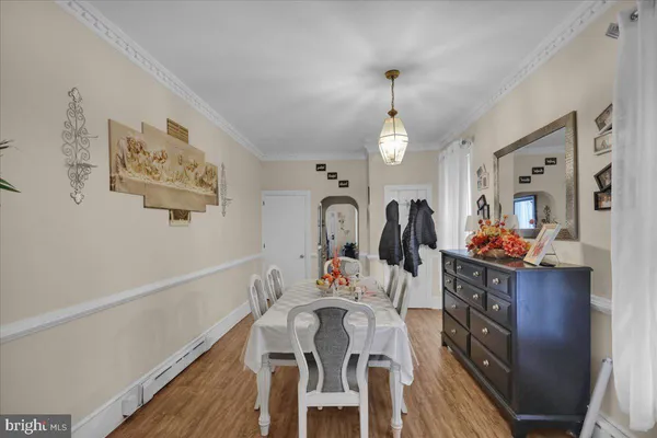 a kitchen with a sink cabinets a counter top space and stainless steel appliances