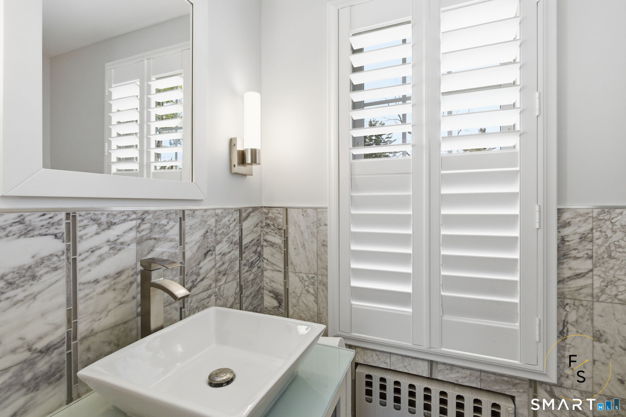 508 Highland Street Wethersfield, CT 06109 - Photo 18 of 40 a bathroom with a shower and a sink