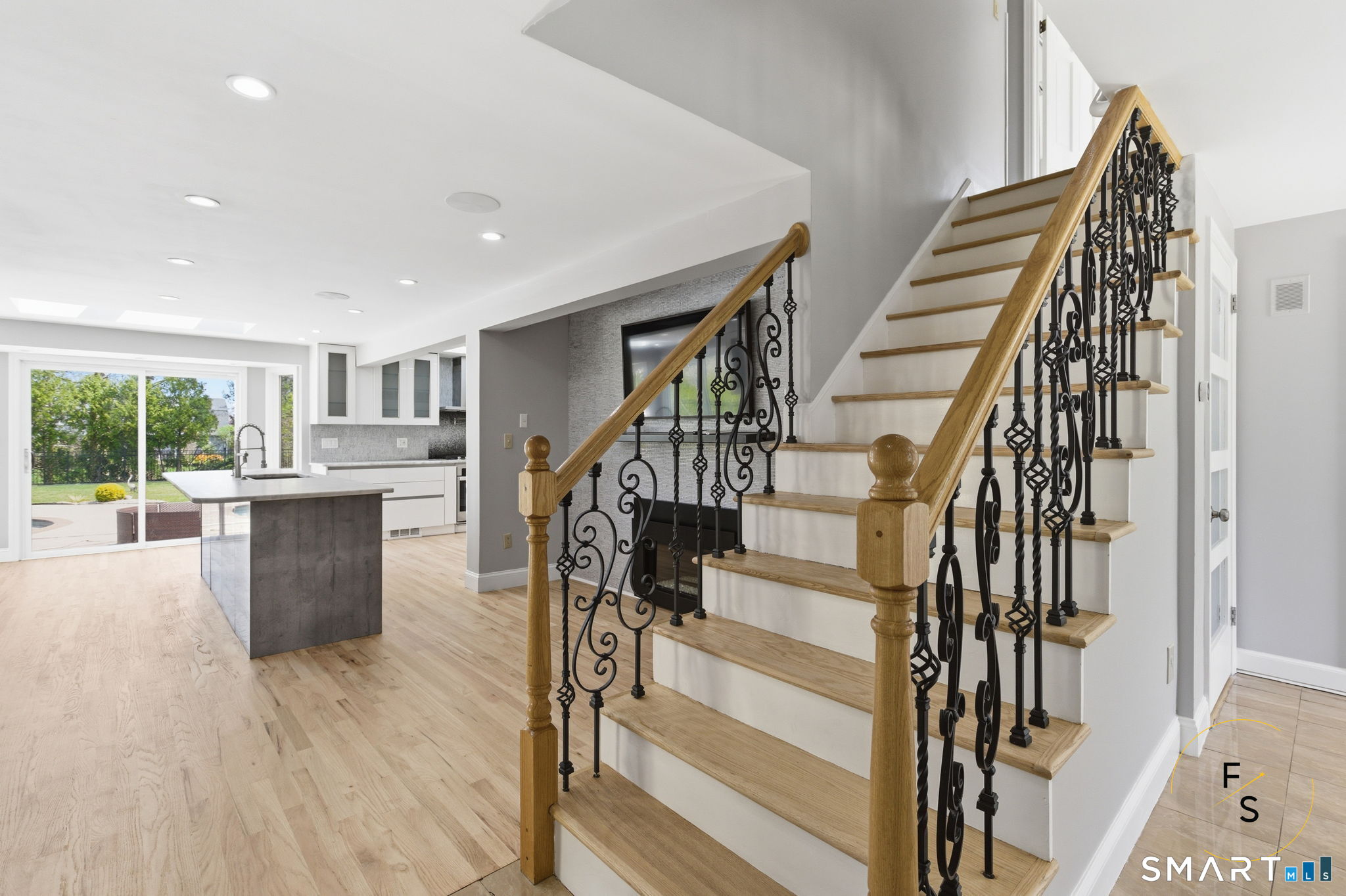 508 Highland Street Wethersfield, CT 06109 - Photo 19 of 40 a view of entryway and kitchen with wooden floor