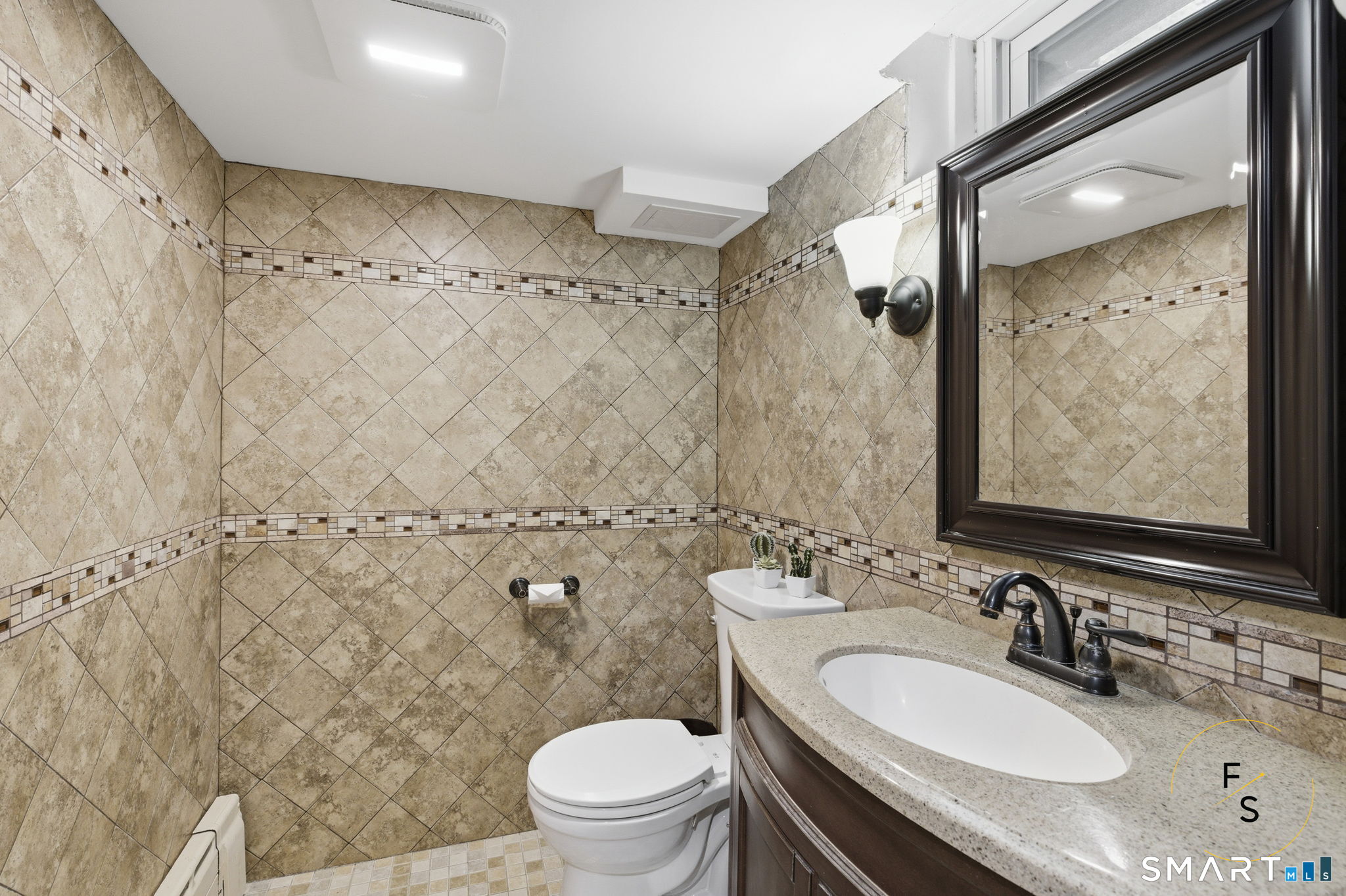 508 Highland Street Wethersfield, CT 06109 - Photo 20 of 40 a bathroom with a sink toilet and shower