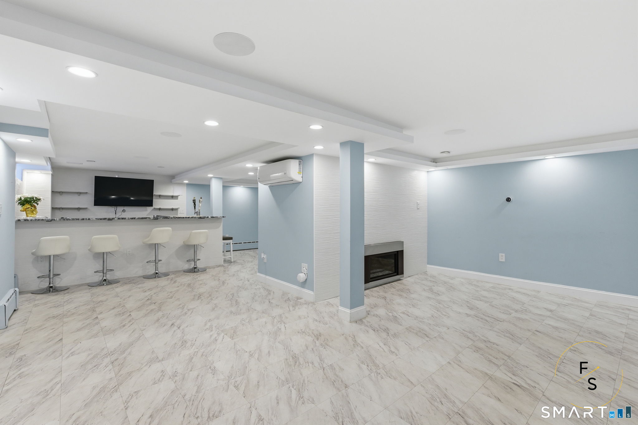 508 Highland Street Wethersfield, CT 06109 - Photo 22 of 40 a view of a kitchen with a sink and a fireplace