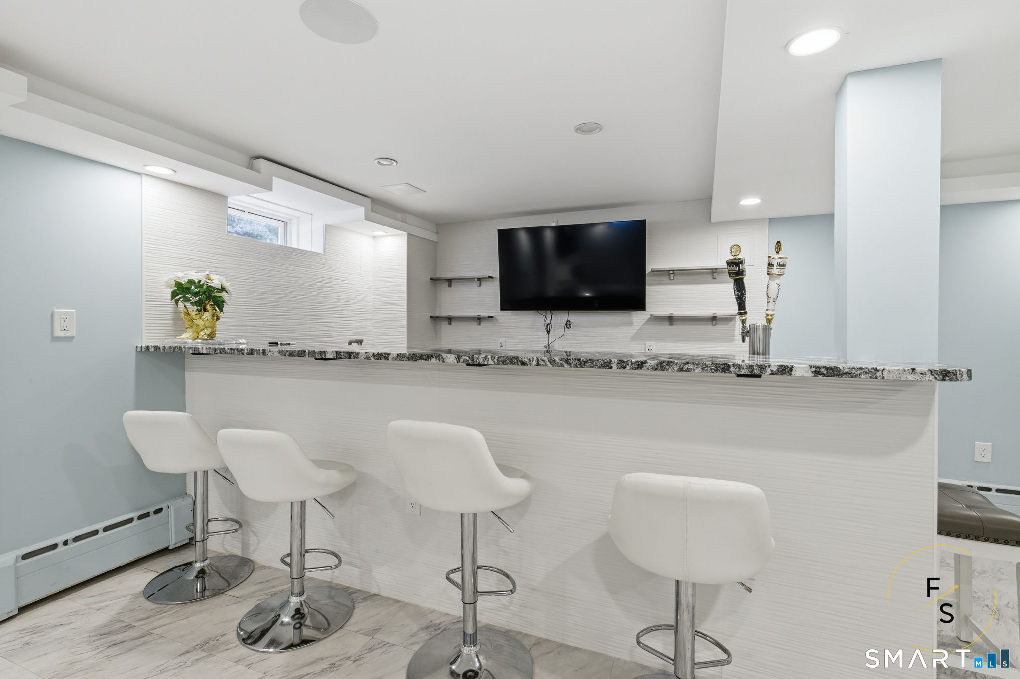 508 Highland Street Wethersfield, CT 06109 - Photo 23 of 40 a living room with furniture and a flat screen tv