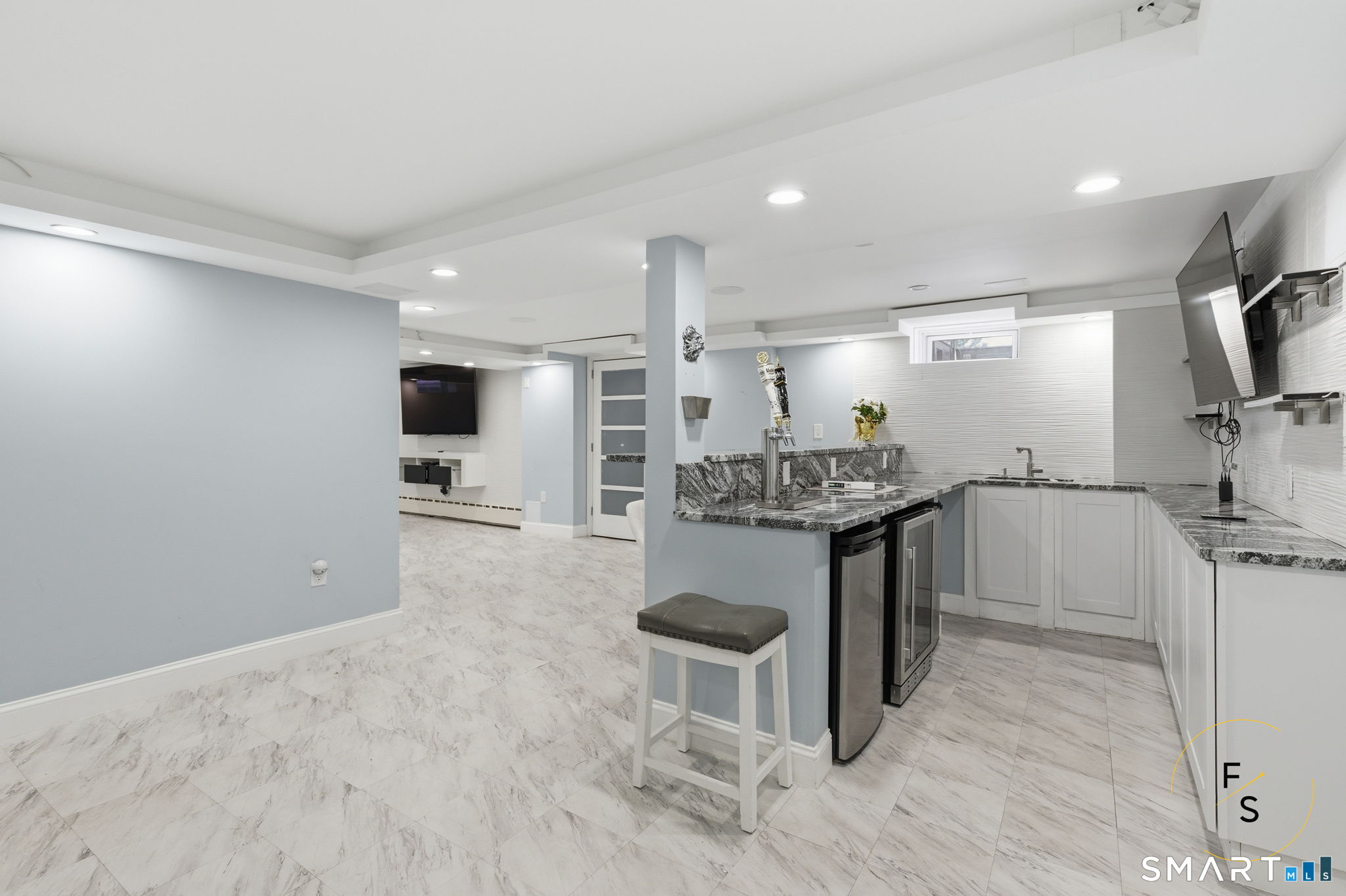 508 Highland Street Wethersfield, CT 06109 - Photo 24 of 40 a kitchen with kitchen island a counter top space a sink stainless steel appliances and cabinets