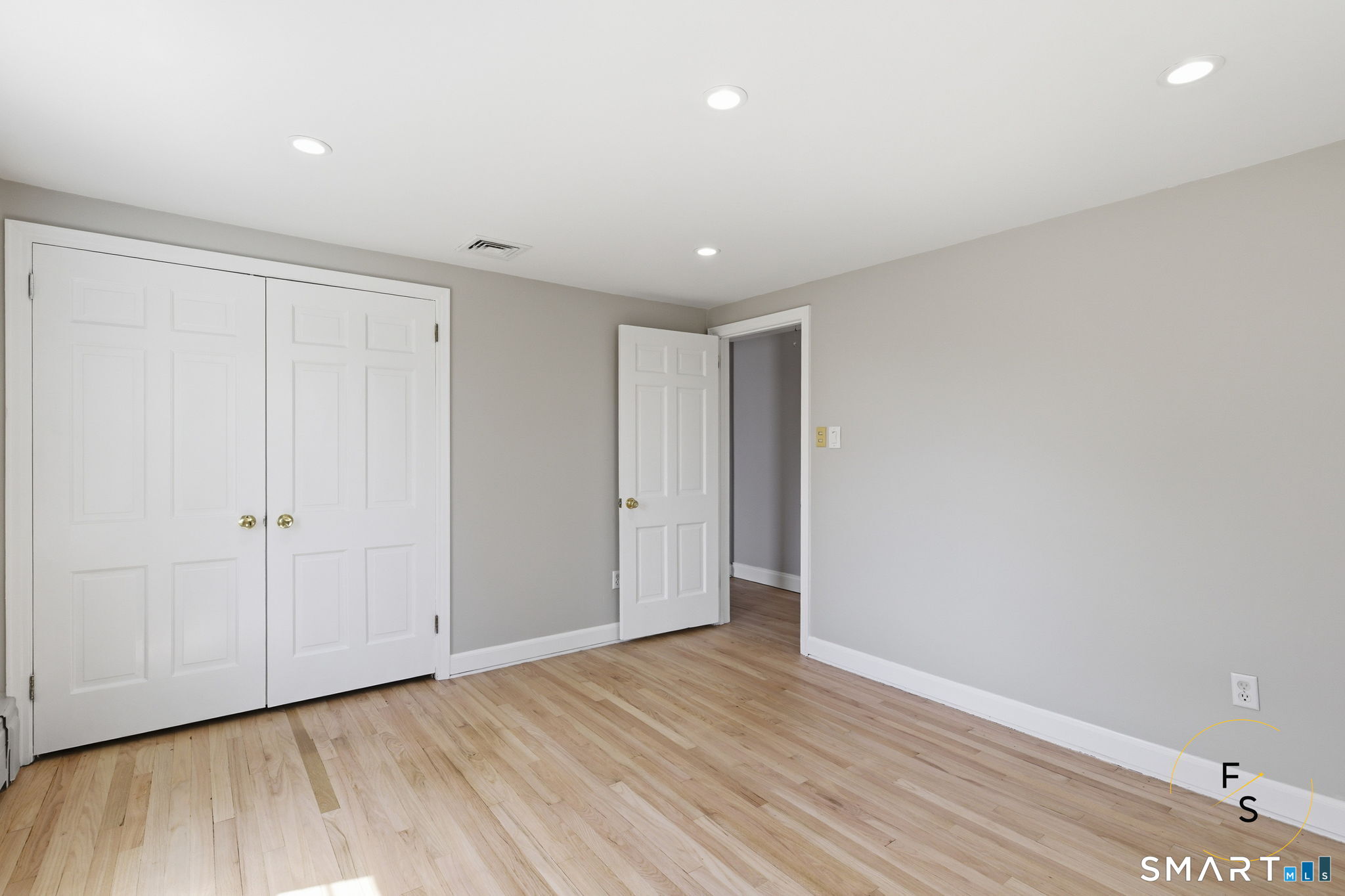 508 Highland Street Wethersfield, CT 06109 - Photo 31 of 40 a view of an empty room with wooden floor