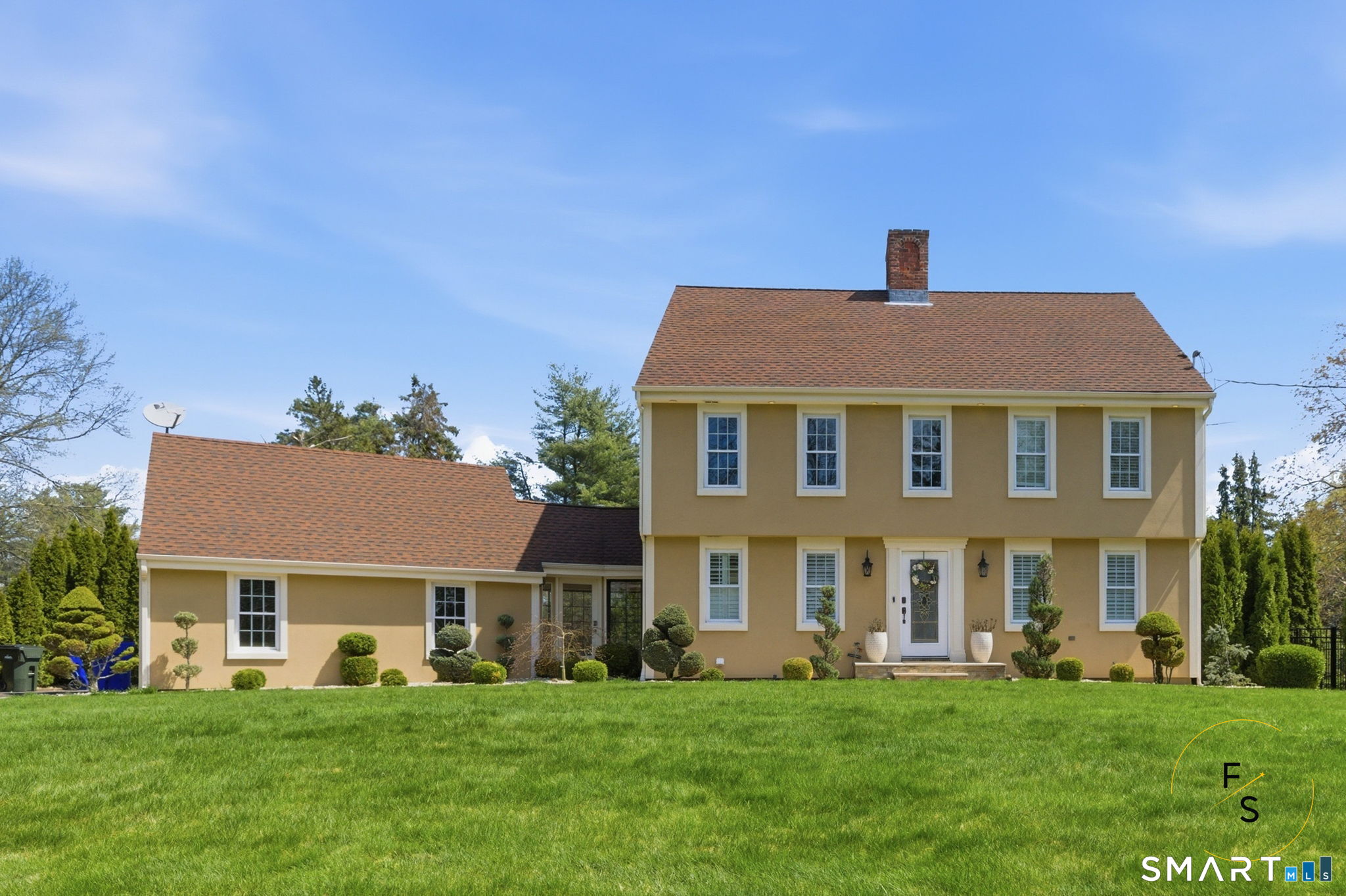 508 Highland Street Wethersfield, CT 06109 - Photo 5 of 40 a front view of a house with a garden