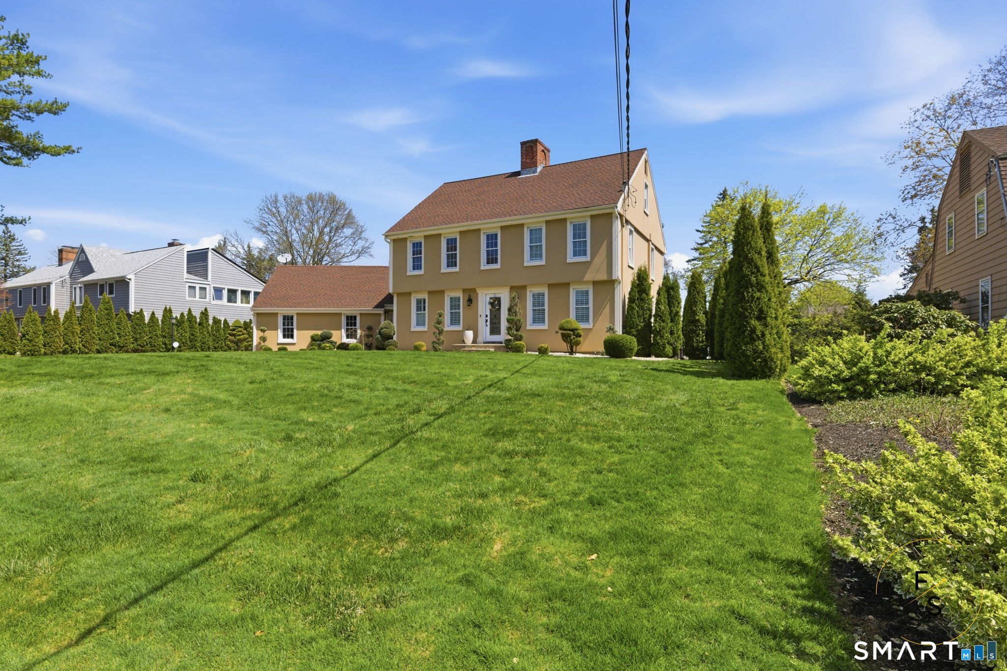 508 Highland Street Wethersfield, CT 06109 - Photo 6 of 40 a front view of a house with a yard