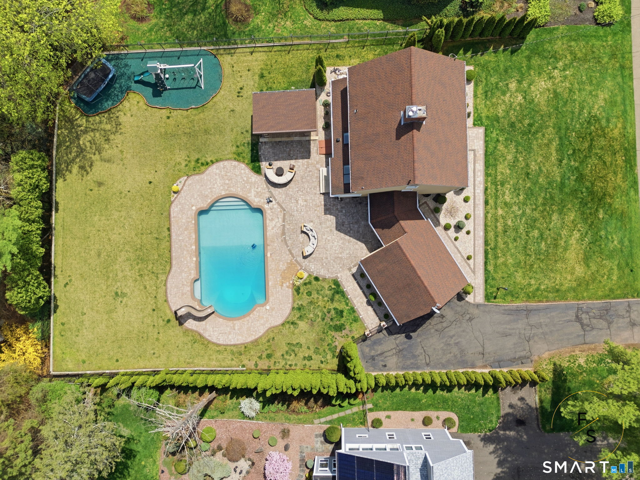 508 Highland Street Wethersfield, CT 06109 - Photo 7 of 40 an aerial view of a house with a garden and trees