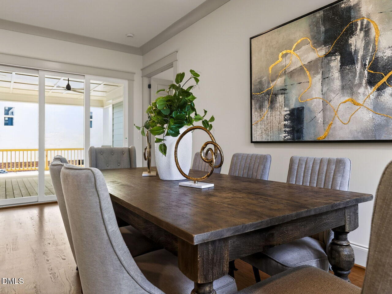 504 Tilden Street Raleigh, NC 27605 - Photo 14 of 58 a view of a dining room with furniture window and wooden floor