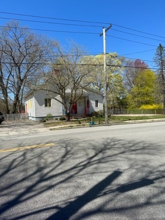 a view of road with a building