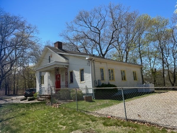 440 Central Avenue Seekonk, MA 02771 - Photo 2 of 11 front view of a house with a yard