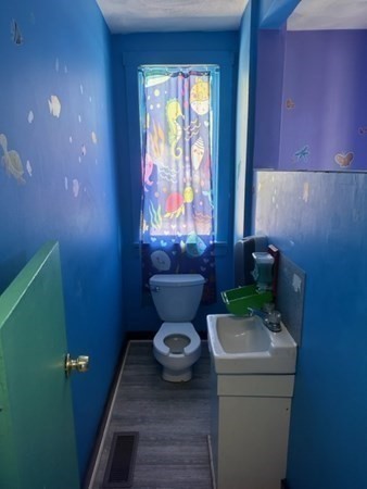440 Central Avenue Seekonk, MA 02771 - Photo 6 of 11 a bathroom with a toilet and a sink