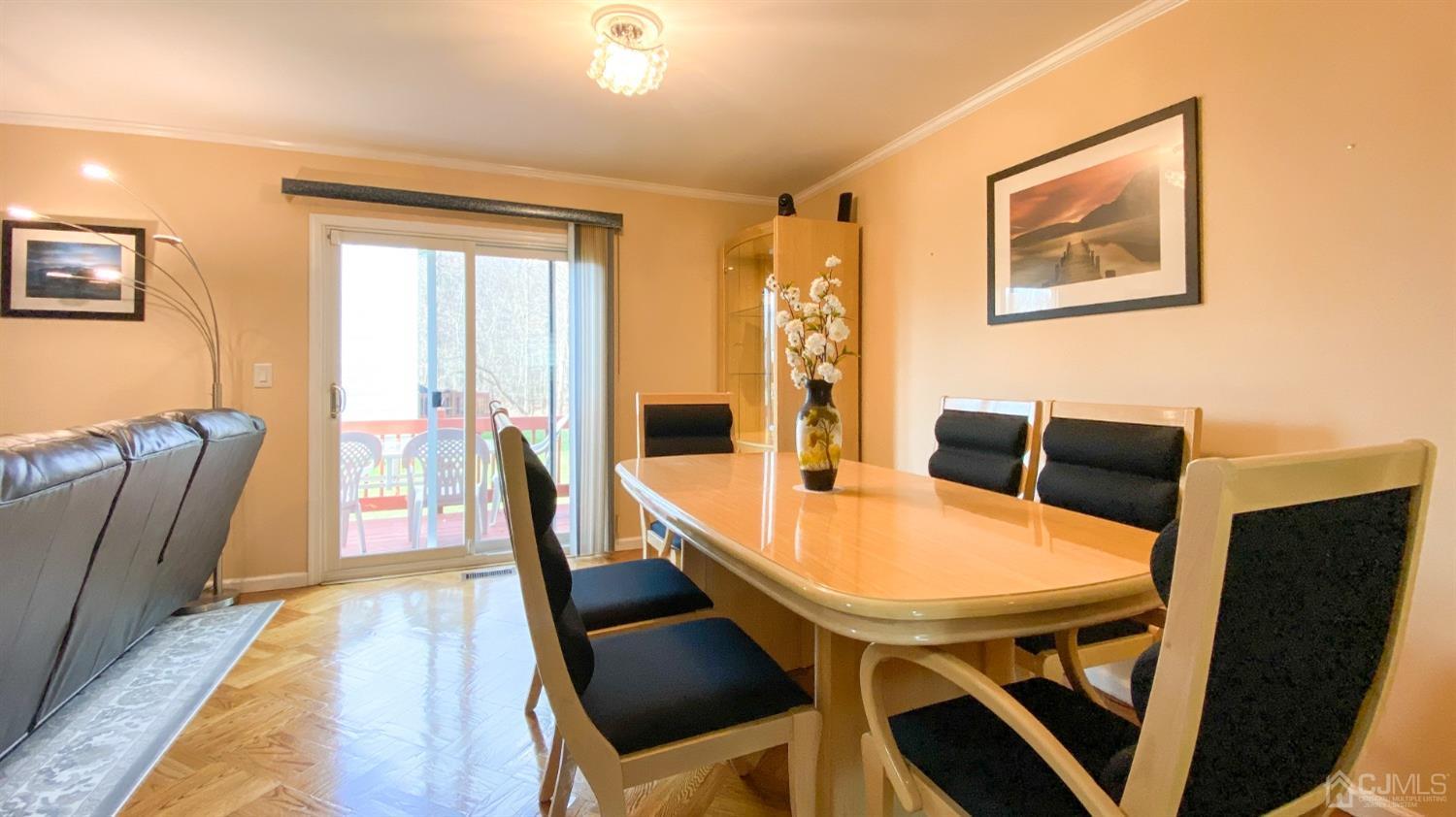 30 Snowflake Lane Edison, NJ 08820 - Photo 11 of 27 a dining room with furniture and wooden floor
