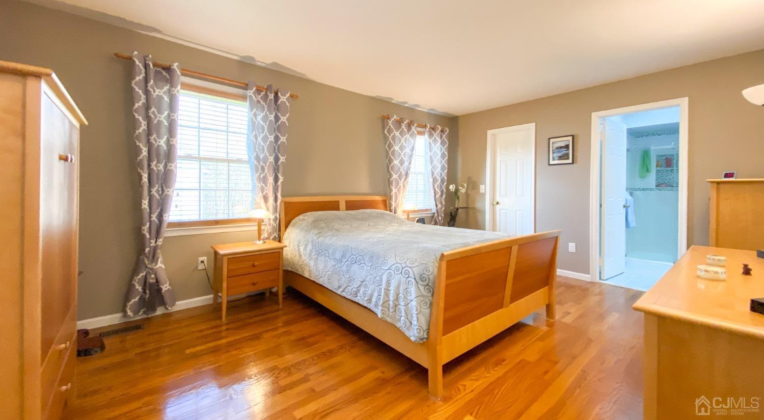 30 Snowflake Lane Edison, NJ 08820 - Photo 12 of 27 a bed room with a bed and a window