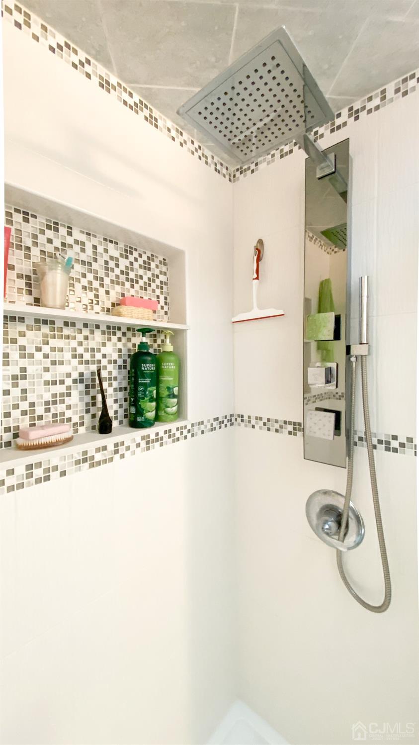 30 Snowflake Lane Edison, NJ 08820 - Photo 15 of 27 a bathroom with a shower