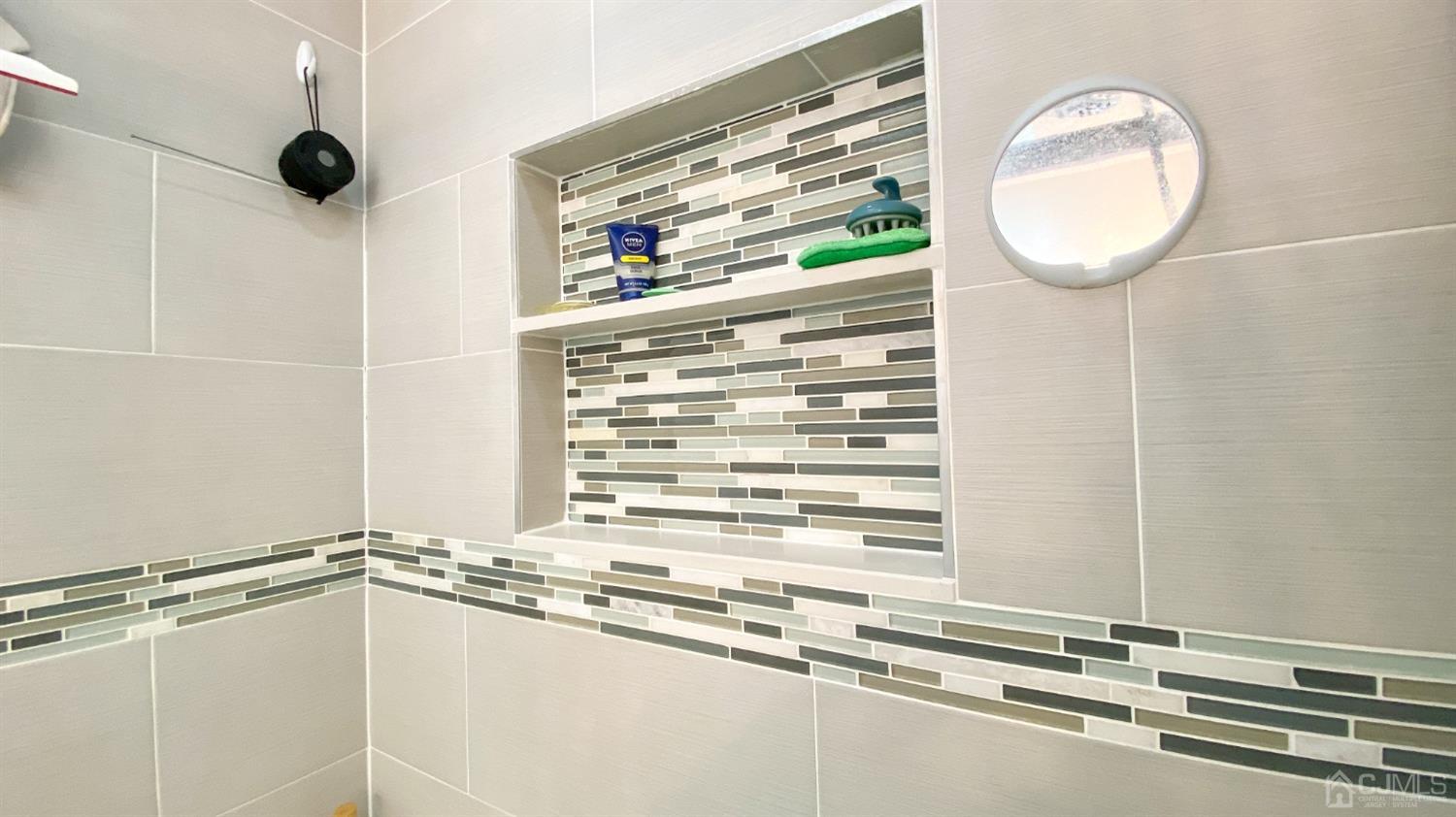 30 Snowflake Lane Edison, NJ 08820 - Photo 20 of 27 a bathroom with a granite countertop sink and a mirror