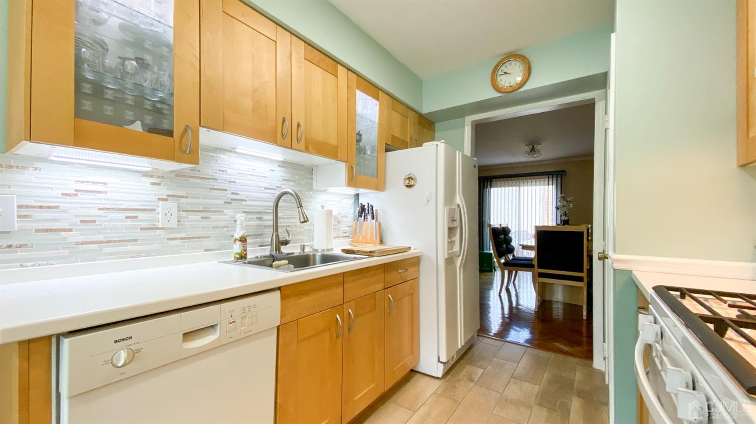 30 Snowflake Lane Edison, NJ 08820 - Photo 4 of 27 a kitchen with a sink and cabinets