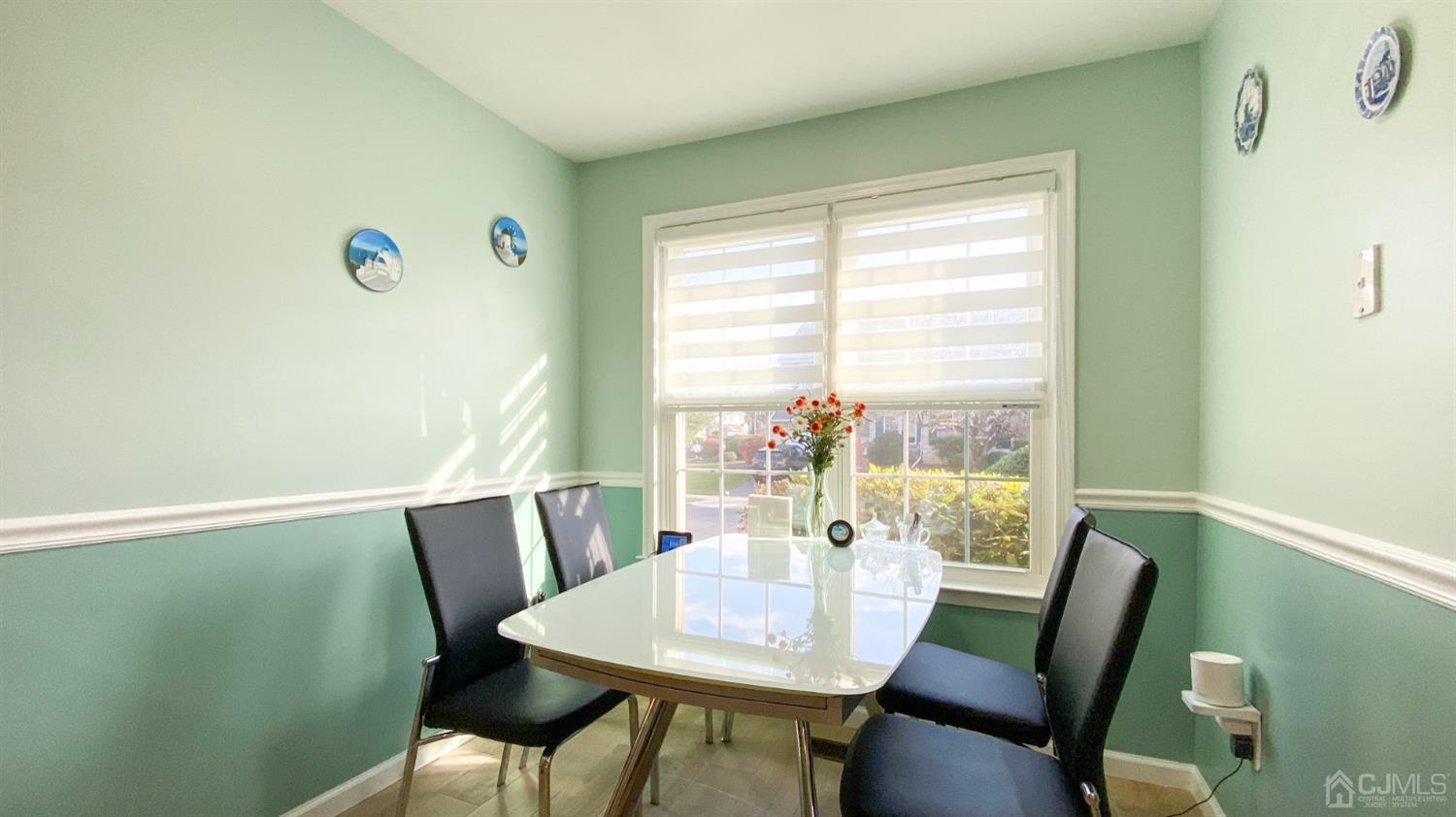 30 Snowflake Lane Edison, NJ 08820 - Photo 6 of 27 a view of a dining room with furniture window and outside view