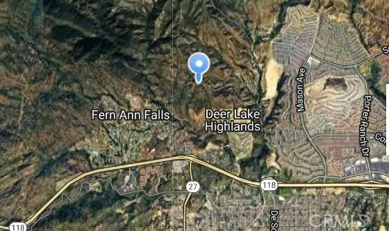 a front view of a house with a street