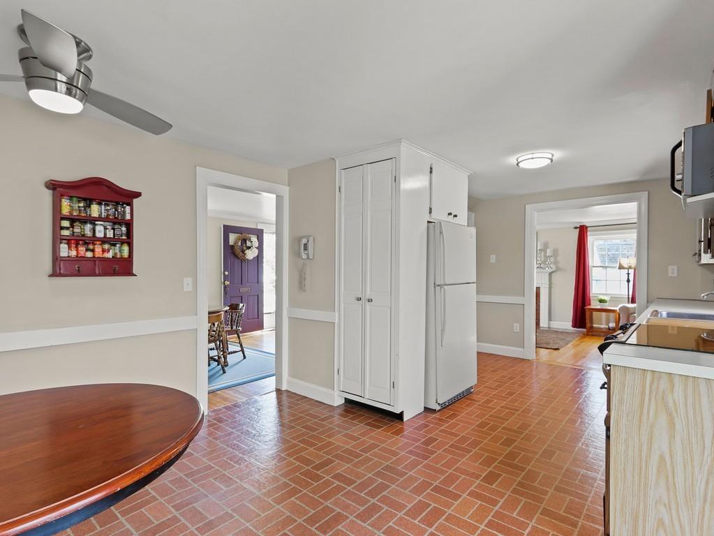 31 Emerson Place Needham, MA 02492 - Photo 11 of 27 a view of a livingroom with furniture and an entryway