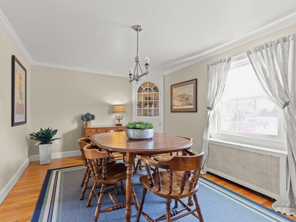 31 Emerson Place Needham, MA 02492 - Photo 13 of 27 a view of a dining room with furniture window and wooden floor
