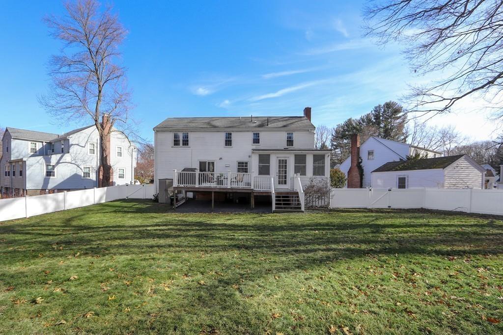 31 Emerson Place Needham, MA 02492 - Photo 27 of 27 a view of a house with a big yard