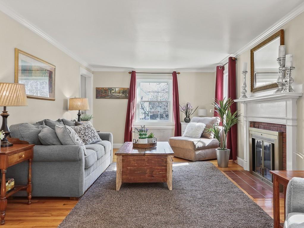 31 Emerson Place Needham, MA 02492 - Photo 4 of 27 a living room with furniture fireplace and window