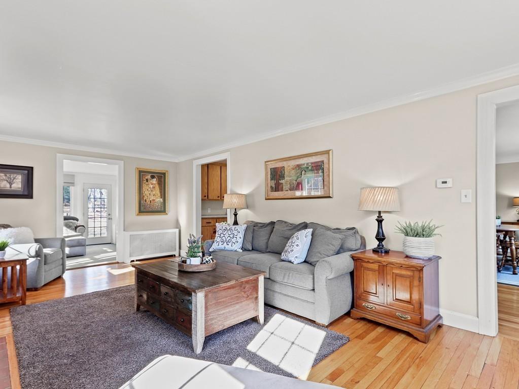 31 Emerson Place Needham, MA 02492 - Photo 5 of 27 a living room with furniture and a wooden floor